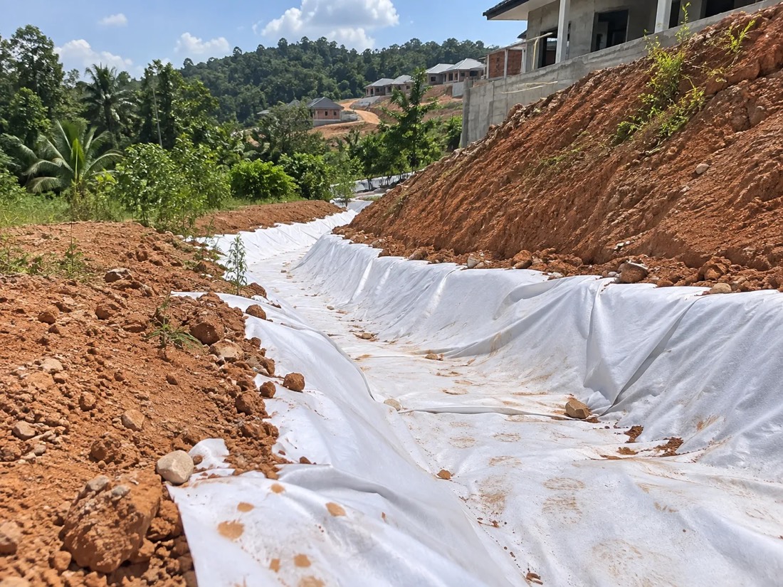 AeroTex lining a slope drain at a housing project